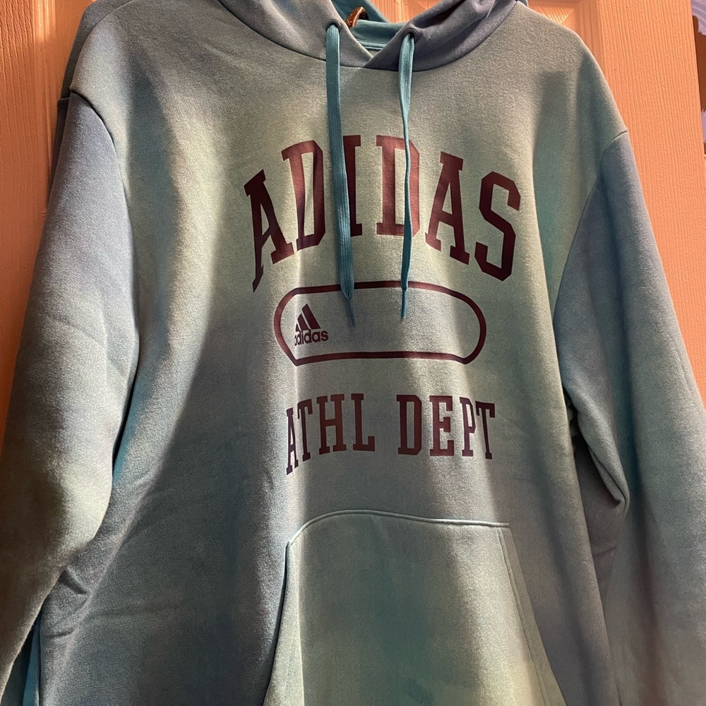 Sweatshirt, the size is XL,The brand is Adidas, The color is blue.
